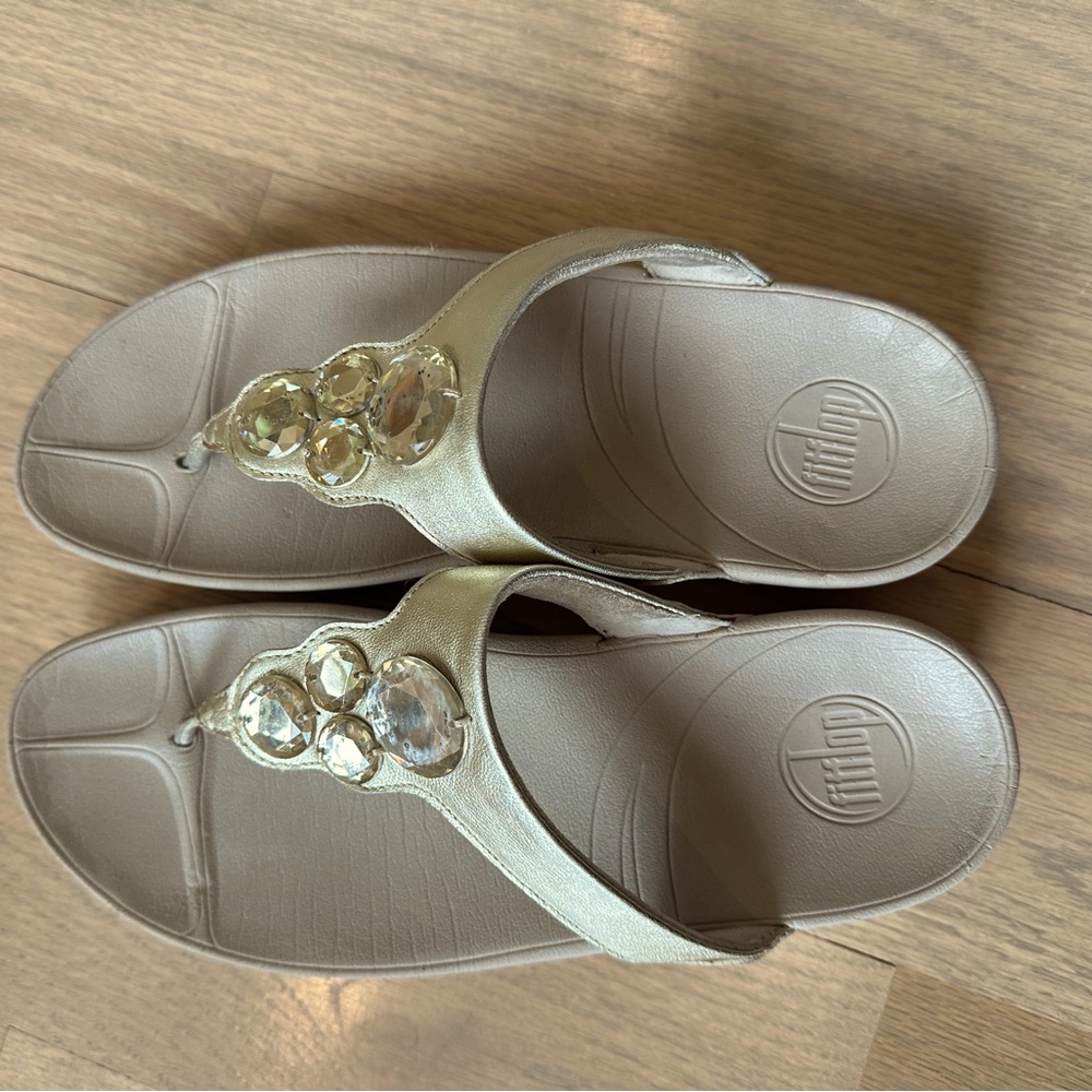 Cream colored FitFlops